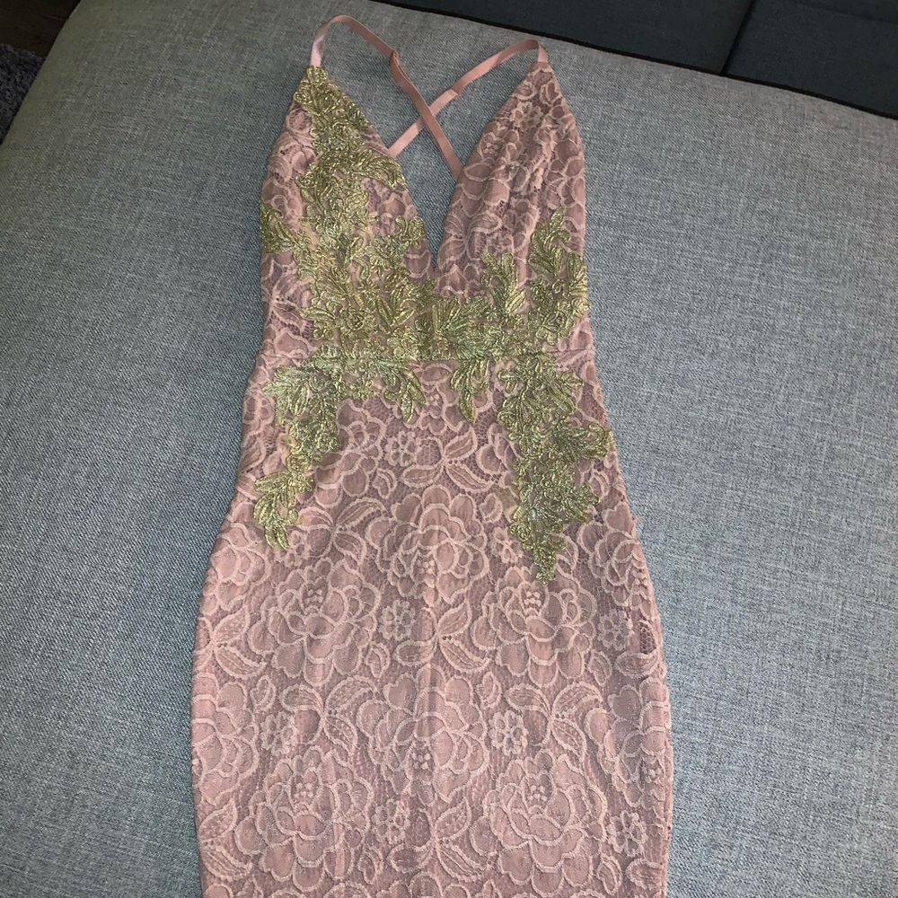 Long blush & gold dress.